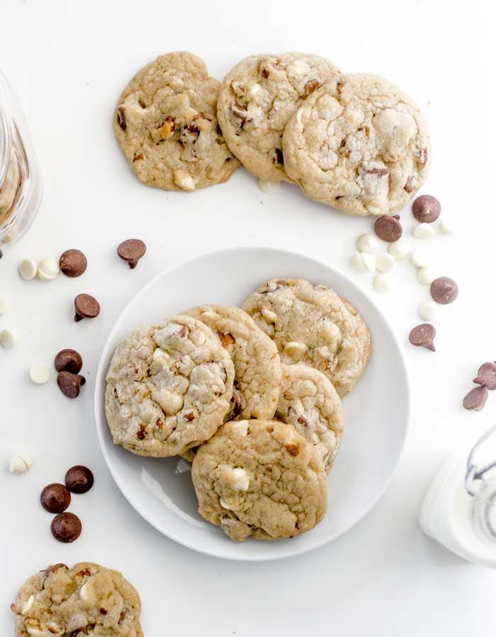 These chocolate chip cookies are inspired by those made at Castle Hill Inn in Newport, RI. They are thick, soft and full of chocolate chips and pecans. Pure heaven for chocolate chip cookie lovers. | www.chicandsugar.com