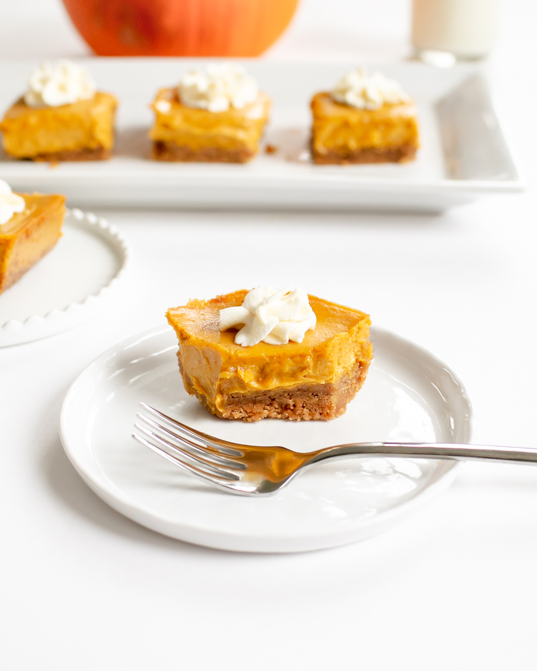 Pumpkin Cheesecake Squares with Maple Whipped Cream