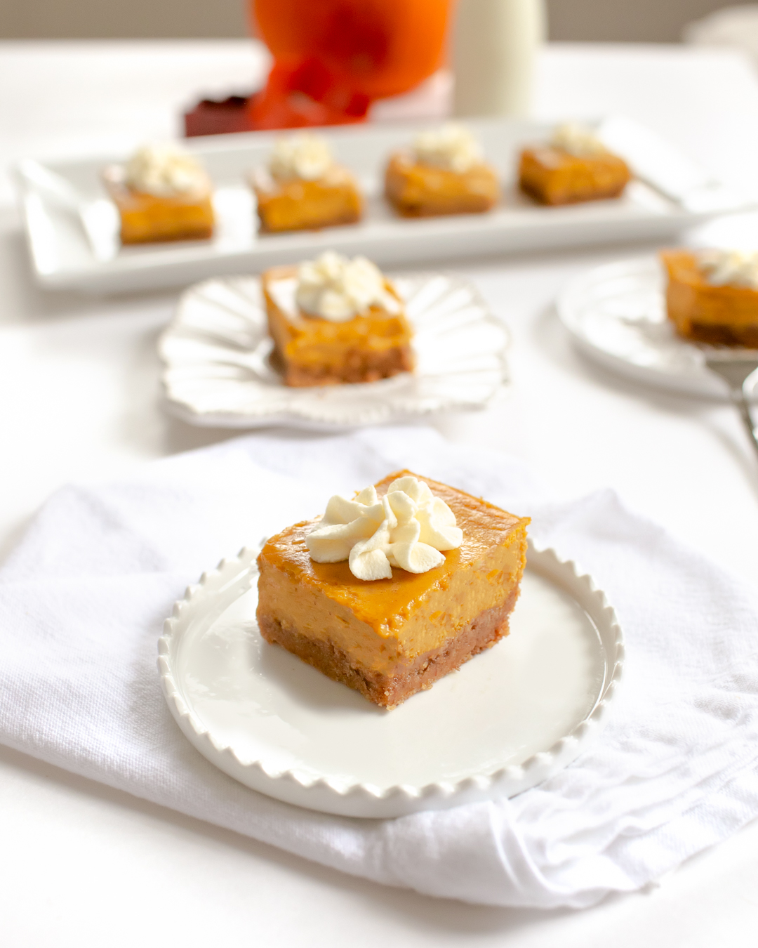 Pumpkin Cheesecake Squares with Maple Whipped Cream