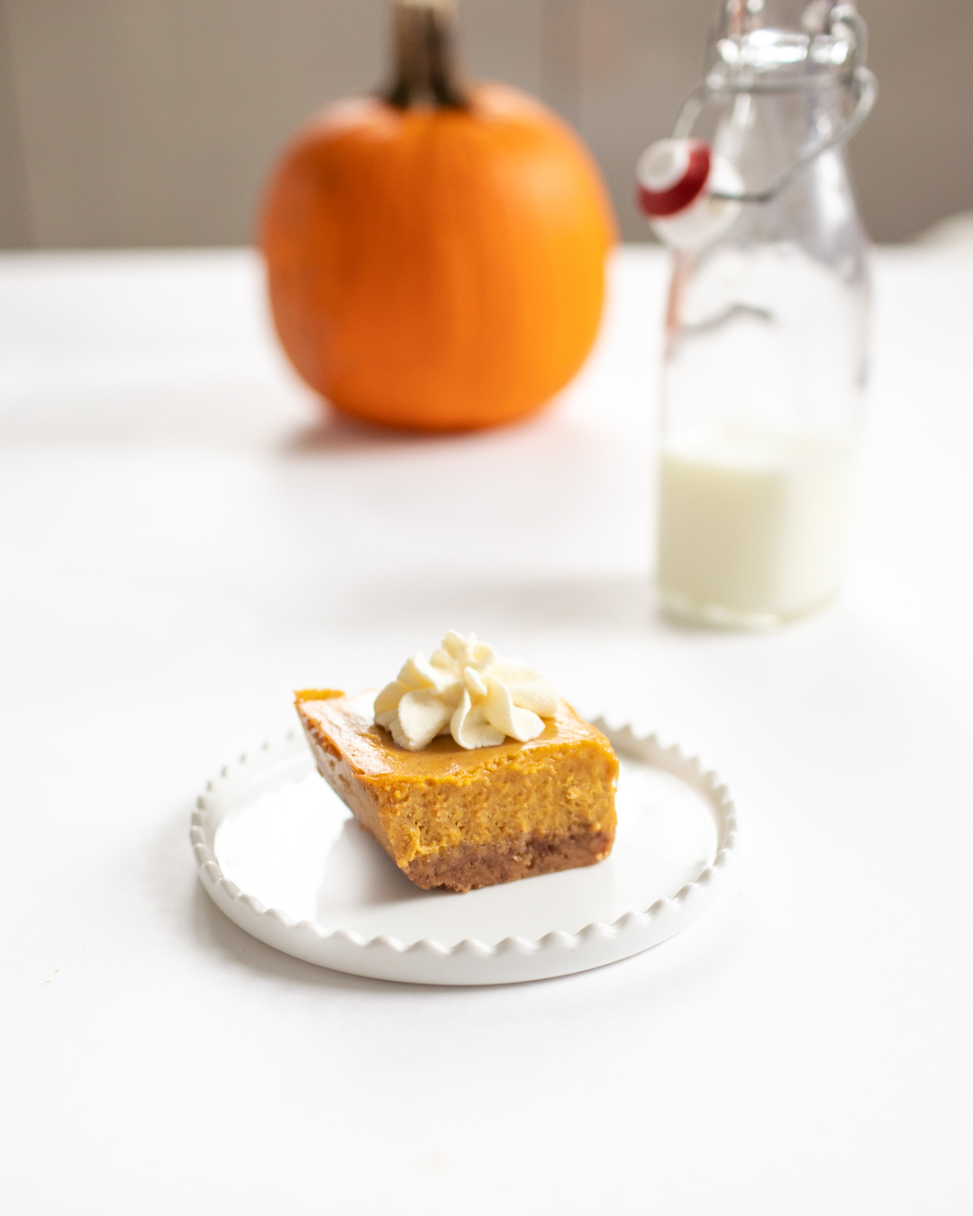Pumpkin Cheesecake Squares with Maple Whipped Cream