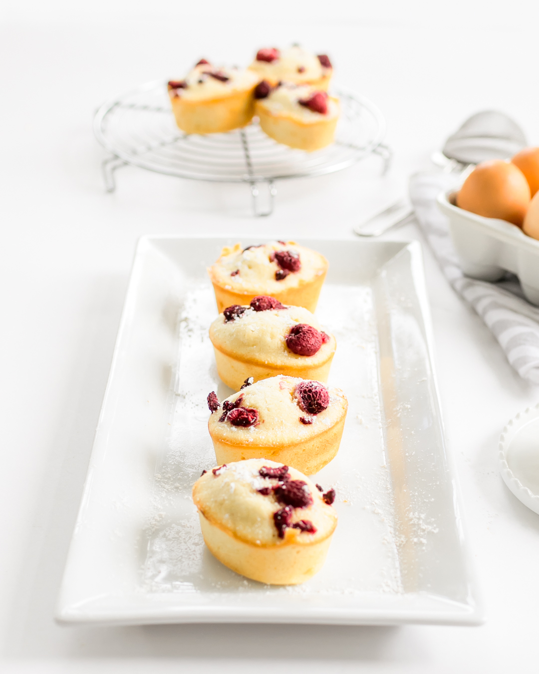 Raspberry Friands (Financiers) on White Plate