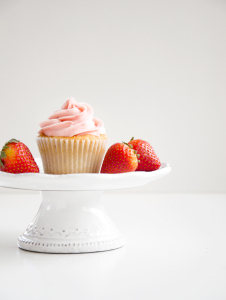 Strawberry Cupcakes with Strawberry Buttercream Frosting. These soft and fruity cupcakes include fresh pureed strawberries for a special dessert for any occasion! | www.chicandsugar.com