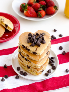 Chocolate Chip Heart Pancakes is the perfect Valentine's Day breakfast or brunch recipe! It doesn't get sweeter than this!| www.chicandsugar.com